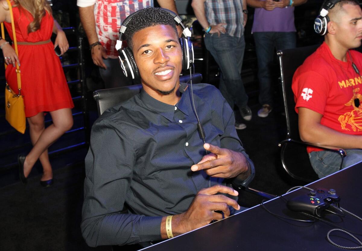 Lakers guard Nick Young attends a promotional event at LA Live in August. Young is expected to start Saturday in the Lakers' preseason opener.