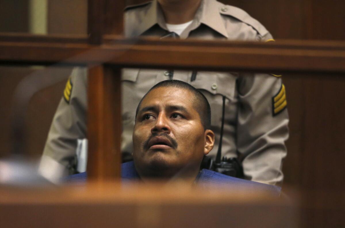 Luis Fuentes, the father who is accused of killing his three sons in a car in South Los Angeles, makes a brief appearance in L.A. Superior Court on Wednesday morning. His arraignment was postponed until Oct. 7, with no bail.