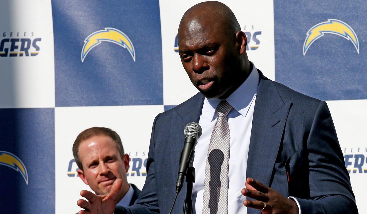 New Chargers Coach Anthony Lynn talks with reporters during his introductory news conference at StubHub Center in Carson.