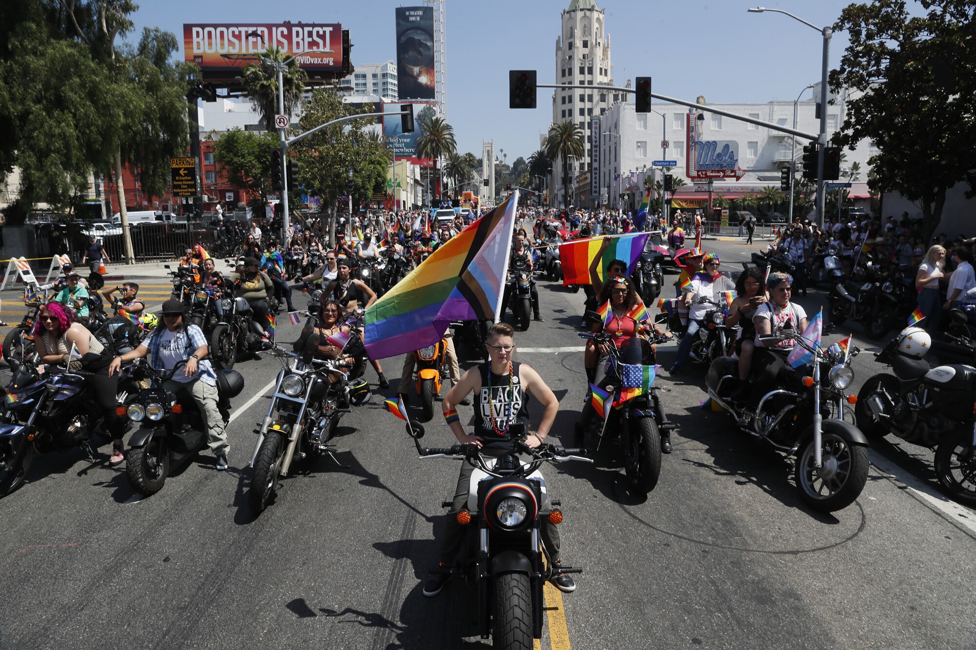 Women on motorcycles in the street