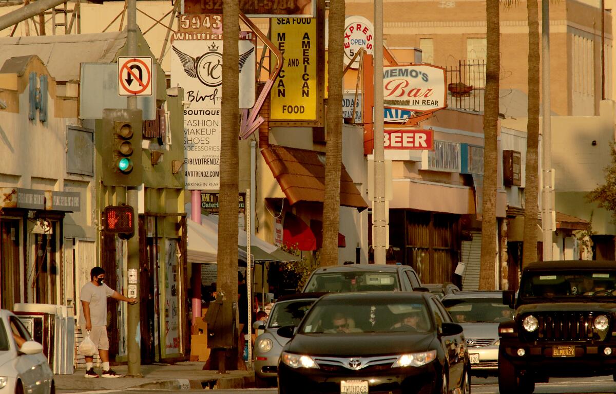 Small shops and restaurants line Whittier Boulevard in East Los Angeles. 