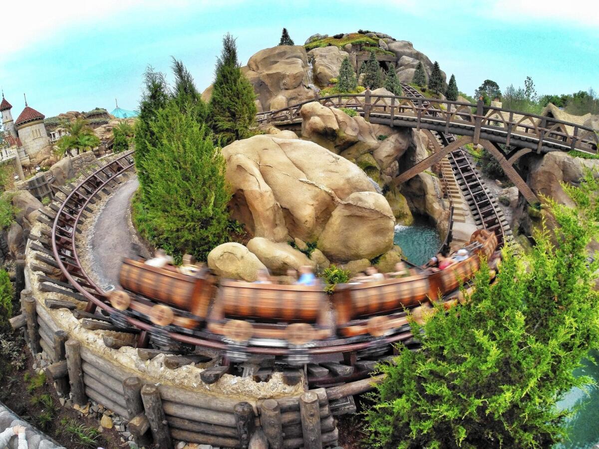 Walt Disney World’s new Seven Dwarfs Mine Train attraction combines elements of a roller coaster and the classic themed dark rides, with audio-animatronic figures considered the most lifelike in the industry.