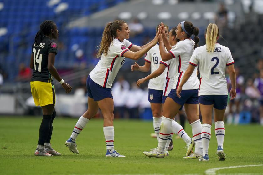 United States' Sophia Smith, second from right, is congratulated by a teammate after scoring her side's second goal against Jamaica during a CONCACAF Women's Championship soccer match in Monterrey, Mexico, Thursday, July 7, 2022. (AP Photo/Fernando Llano)