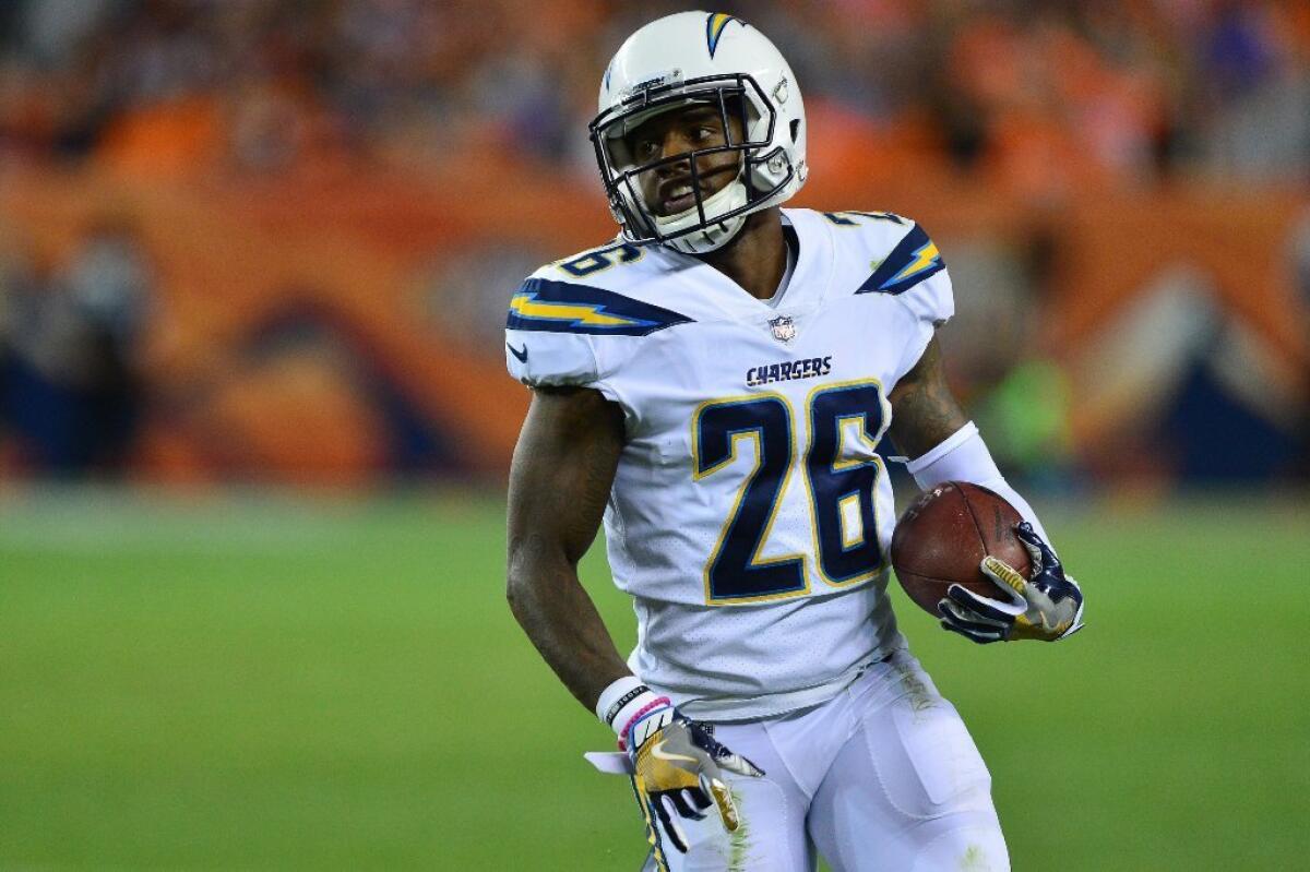 Chargers cornerback Casey Hayward runs with ball after receiving a fumble during the second half of a game against the Denver Broncos on Sept. 11.