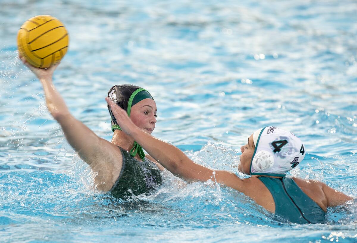 Costa Mesa's Morgan Taylor takes a shot against Aliso Niguel's Lexi Van Den Berg during a CIF Division 3 playoff game.