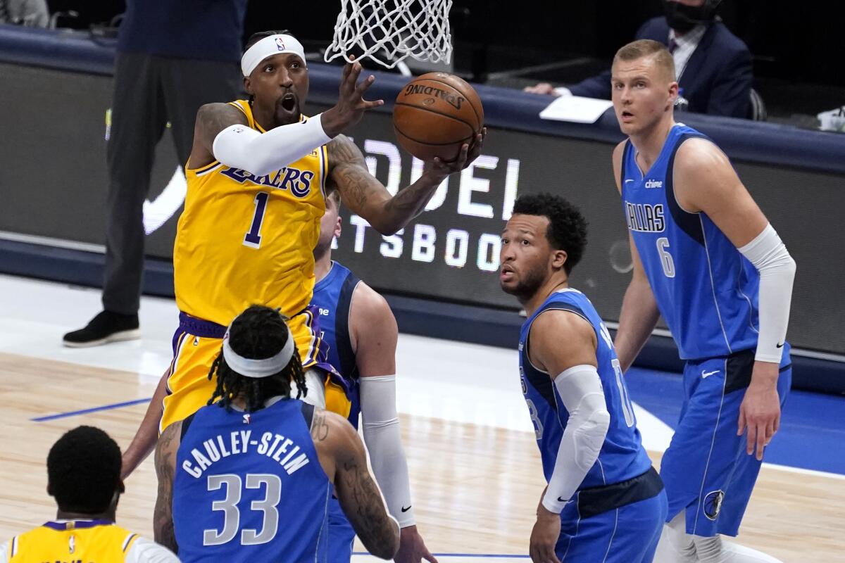 Lakers guard Kentavious Caldwell-Pope attempts a layup.