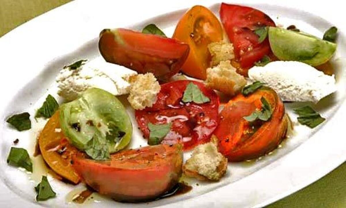 SUMMER SALAD: Ricotta cheese, heirloom tomatoes -- and homemade croutons.