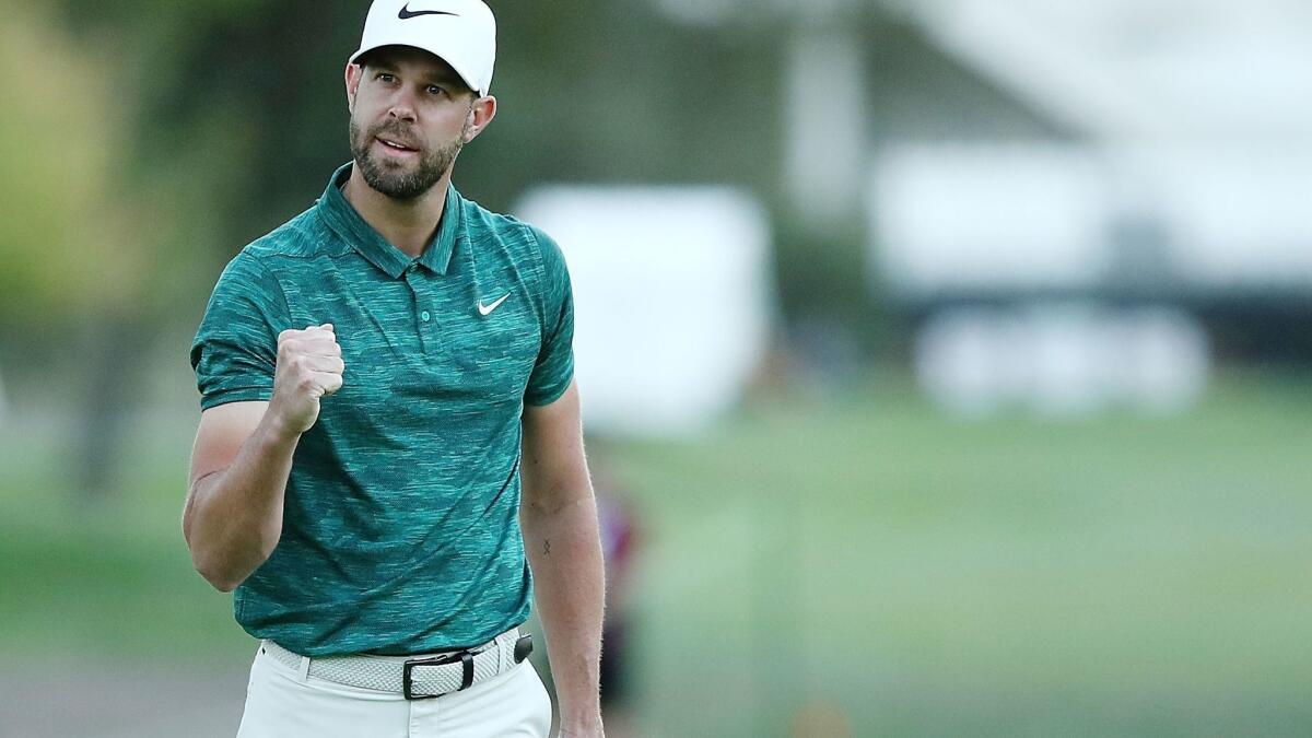 Kevin Tway putts in to win on a third hole sudden death playoff against Ryan Moore on the 10th green during the final round of the Safeway Open on Sunday.