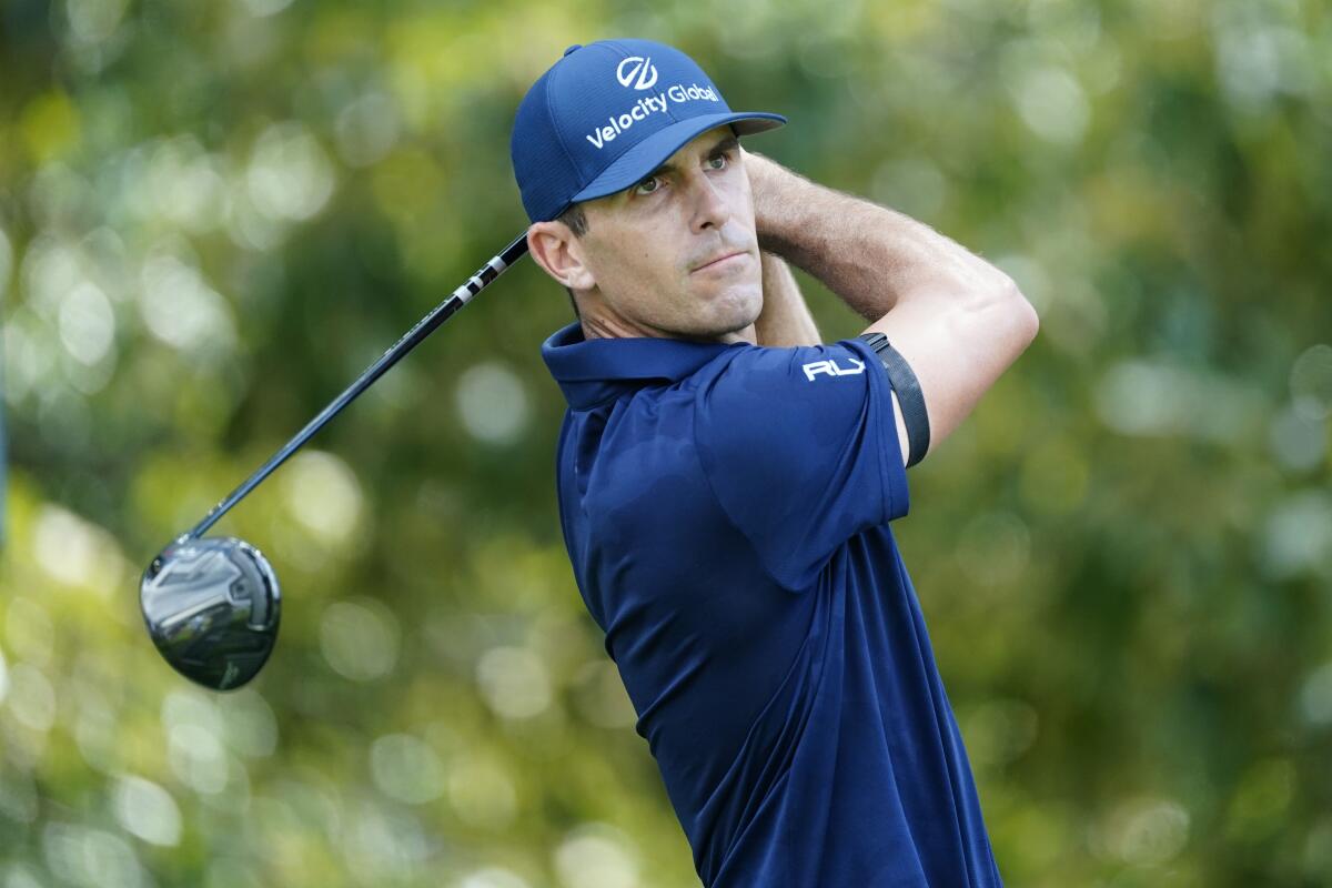 Billy Horschel hits off the third tee during the second round of the Tour Championship golf tournament at East Lake Golf Club, Friday, Aug. 26, 2022, in Atlanta. (AP Photo/John Bazemore)