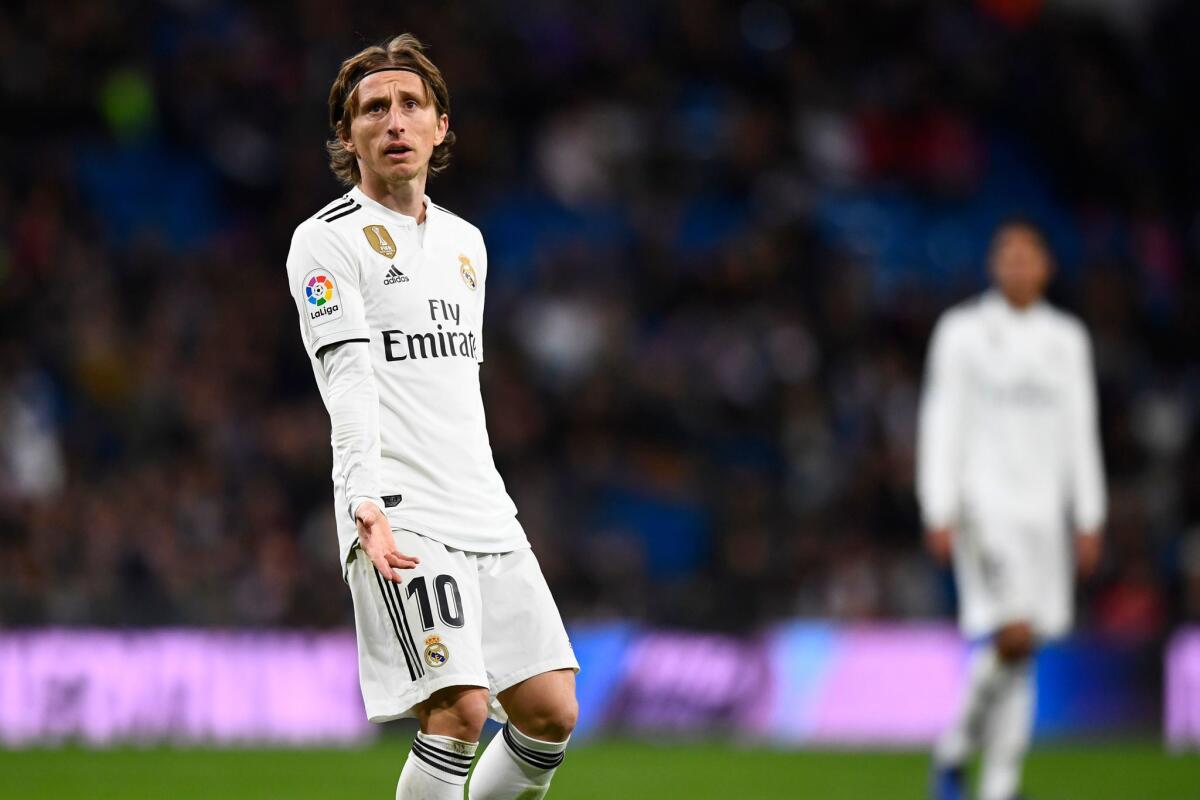 Real Madrid's Croatian midfielder Luka Modric gestures during the Spanish League football match between Real Madrid CF and Real Sociedad at the Santiago Bernabeu stadium in Madrid on January 6, 2019.