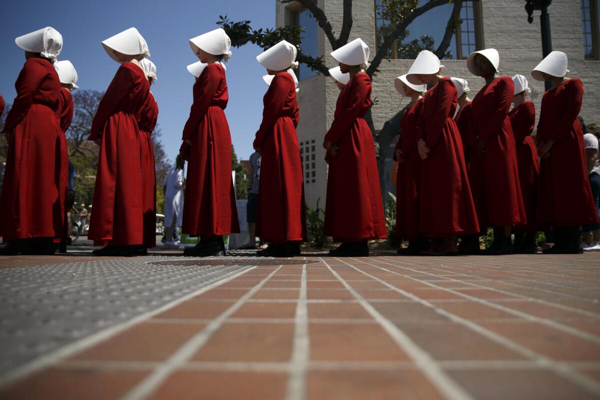 Hulu's adaptation of "The Handmaid's Tale" sent actresses to the L.A. Times Festival of Books on Sunday for some live marketing.