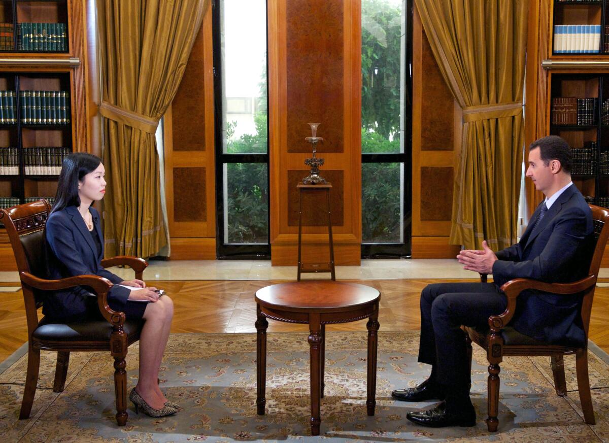 Syrian President Bashar Assad gives an interview in Damascus to China's CCTV.