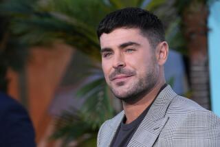 Zac Efron poses at the premiere of the Netflix film "A Family Affair" at the Egyptian Theatre, Thursday, July 13, 2024, in Los Angeles. (AP Photo/Chris Pizzello)