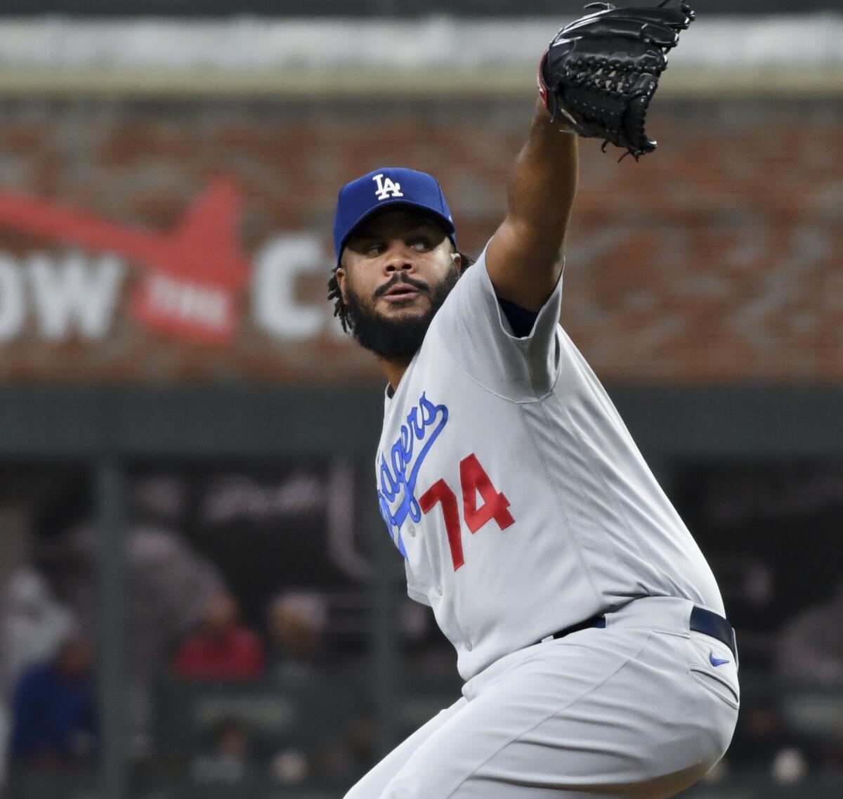 Dodgers relief pitcher Kenley Jansen delivers during the eighth inning.