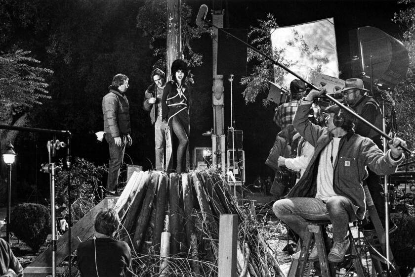 Feb. 8, 1988: Cassandra Peterson as Elvira tied to stake in scene from her movie âEvira: Mistress of the Dark.â This photo was published in the March 20, 1988 Los Angeles Times.