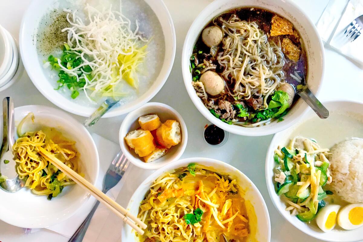 From top left, juk, tom yum soup, khao soi and green curry from Sweet Rice.