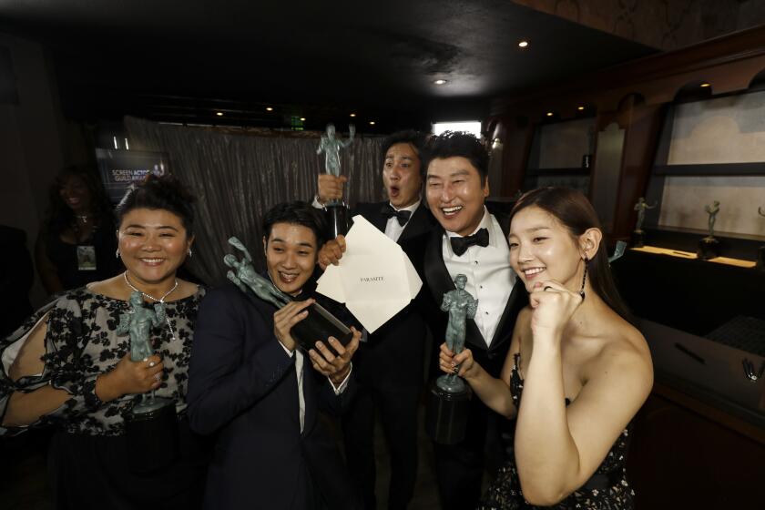 LOS ANGELES, CA - January 19, 2020: Jeong-eun Lee, Woo-sik Choi, Sun-kyun Lee, Song Kang Ho and So-dam Park backstage at the 26th Screen Actors Guild Awards at the Los Angeles Shrine Auditorium and Expo Hall on Sunday, January 19, 2020. (Al Seib / Los Angeles Times)