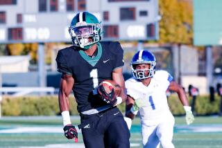 Dijon Stanley of Granada Hills takes off on a 90-yard touchdown run in first half against Palisades. 