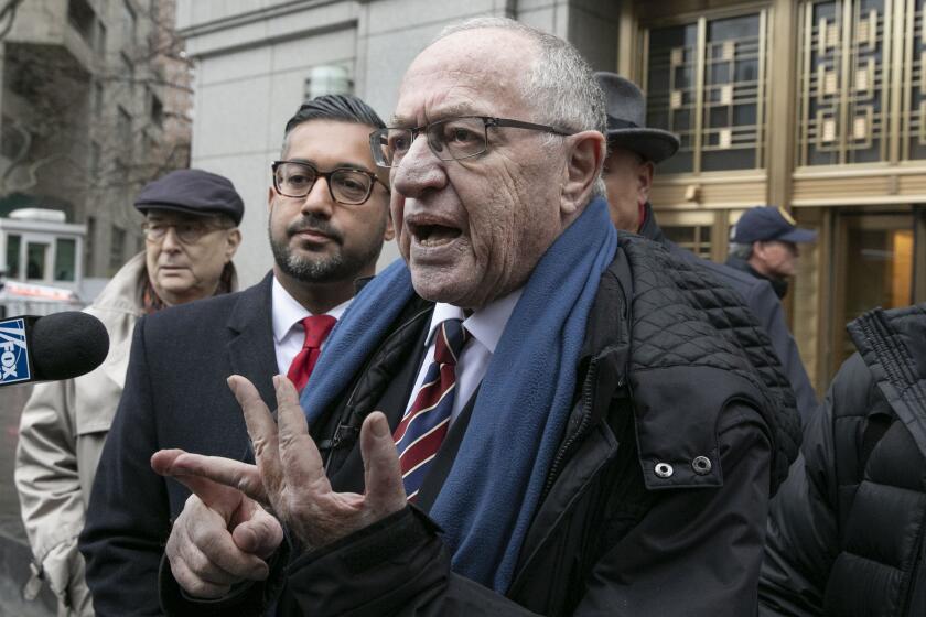 Attorney Alan Dershowitz talks to the press outside federal court, in New York, Monday, Dec. 2, 2019. Dershowitz on Monday attended a court hearing in his ongoing legal battle with Virginia Roberts Giuffre, a woman who claims to have been pressured into having sex with Dershowitz by Jeffrey Epstein when she was 17. She and Dershowitz are suing each other, each claiming the other is lying. (AP Photo/Richard Drew)