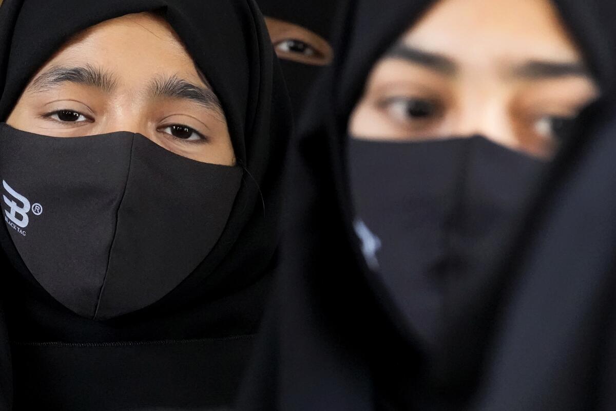 Indian scholars, activists criticize school hijab ban ruling - The San  Diego Union-Tribune