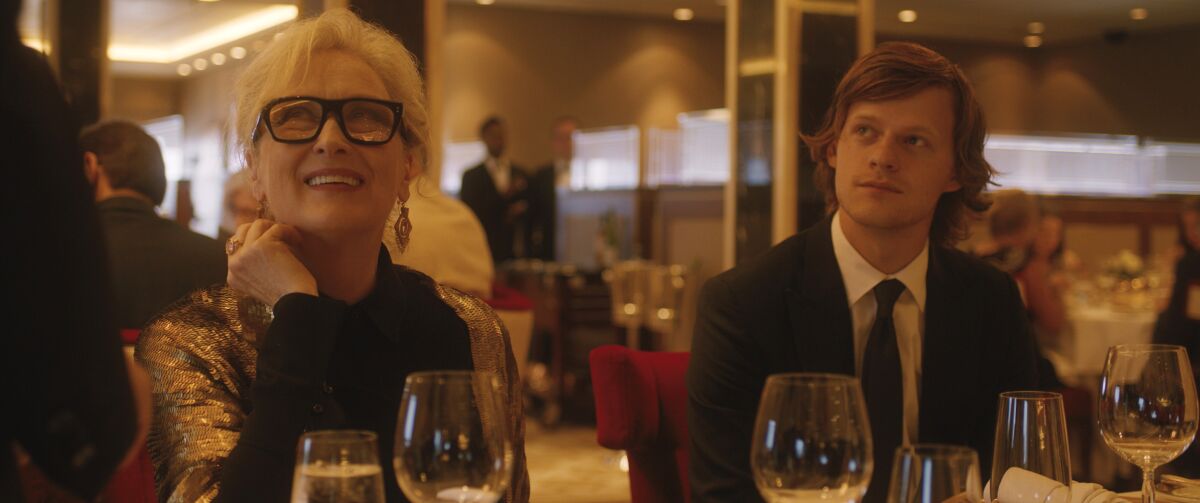 Meryl Streep and Lucas Hedges dine aboard a cruise ship in the movie "Let Them All Talk."