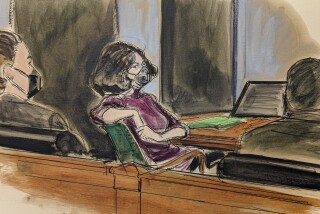 In this courtroom sketch, Ghislaine Maxwell, center, sits in the courtroom during a discussion about a note from the jury, during her sex trafficking trial, Wednesday, Dec. 29, 2021, in New York. (AP Photo/Elizabeth Williams)