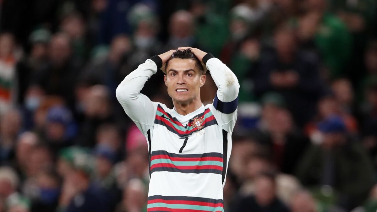 Portugal's Cristiano Ronaldo reacts after a missed chance to score during the World Cup 2022 group A qualifying soccer match between the Republic of Ireland and Portugal at the Aviva stadium in Dublin, Thursday, Nov. 11, 2021. (AP Photo/Peter Morrison)
