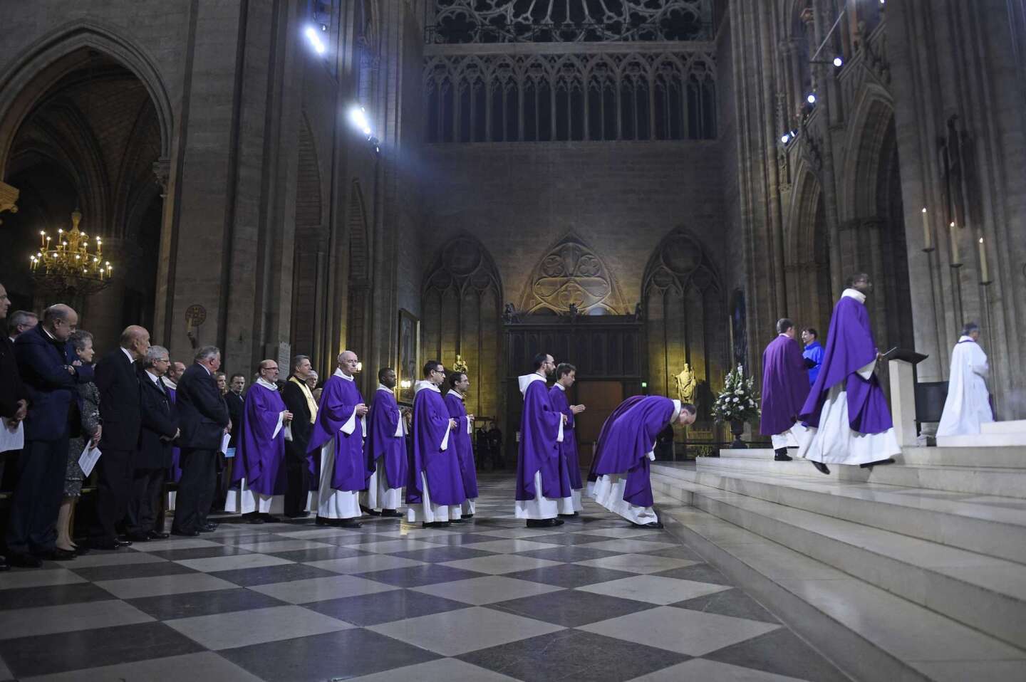 Prelates arrive to celebrate a Mass in memory of the attack victims at the Notre Dame cathedral.