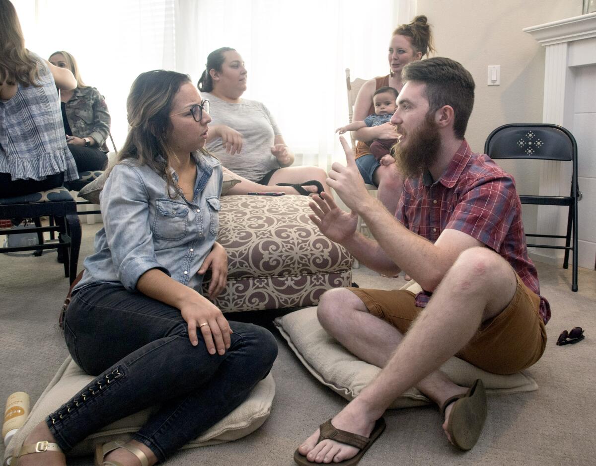 Attendees broke into groups to discuss personality types during the Enneagram workshop in Riverside.