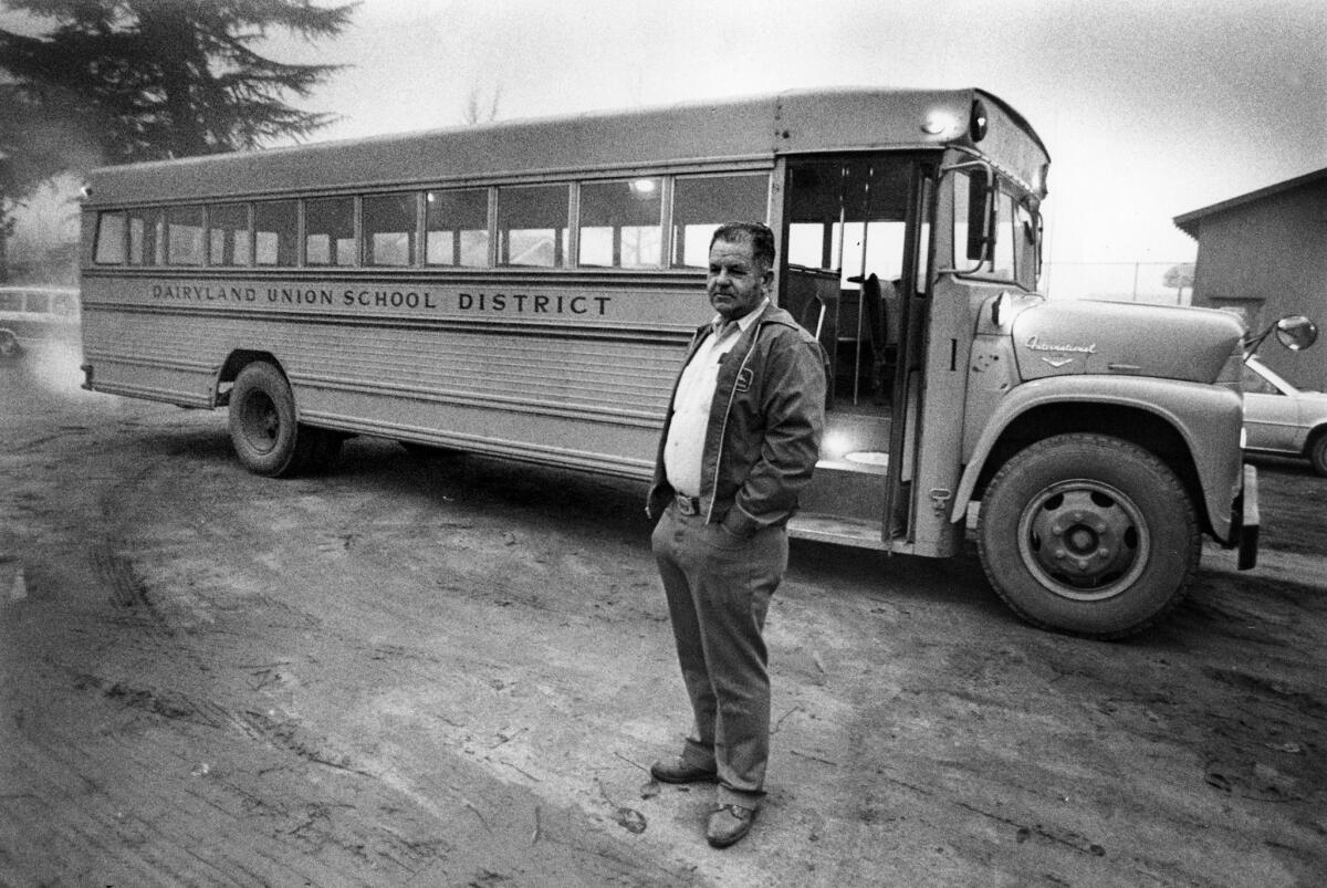 Jan. 6, 1983: Bus driver Ed Ray in front of the bus he drove the day of the Chowchilla kidnapping.