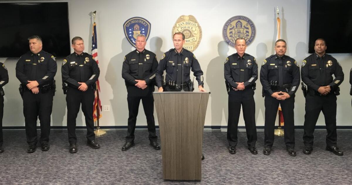 San Diego police Chief David Nisleit, flanked by his command staff, speaks at a news conference Monday night about the apparent suicide of Sgt. Joseph Ruvido, 49, who was accused of soliciting a minor for sex.