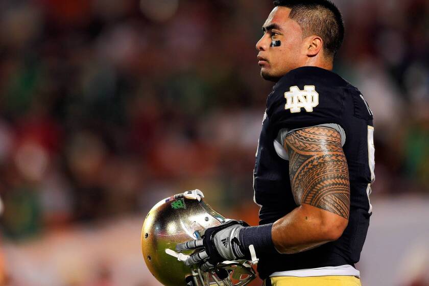 Manti Te'o of the Notre Dame Fighting Irish warms up before playing the Alabama Crimson Tide in the 2013 BCS National Championship game at Sun Life Stadium on Jan. 7, 2013, in Miami Gardens, Fla.
