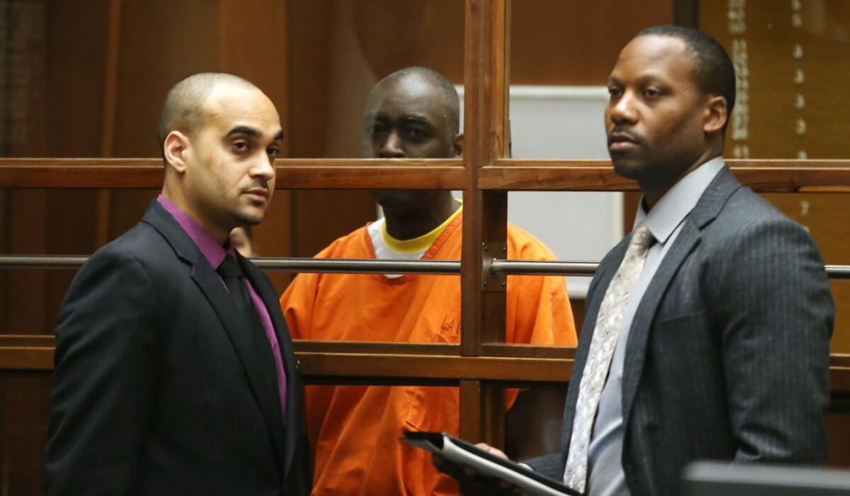 Actor Michael Jace, center, and his attorneys appear in Los Angeles Superior Court on Friday.