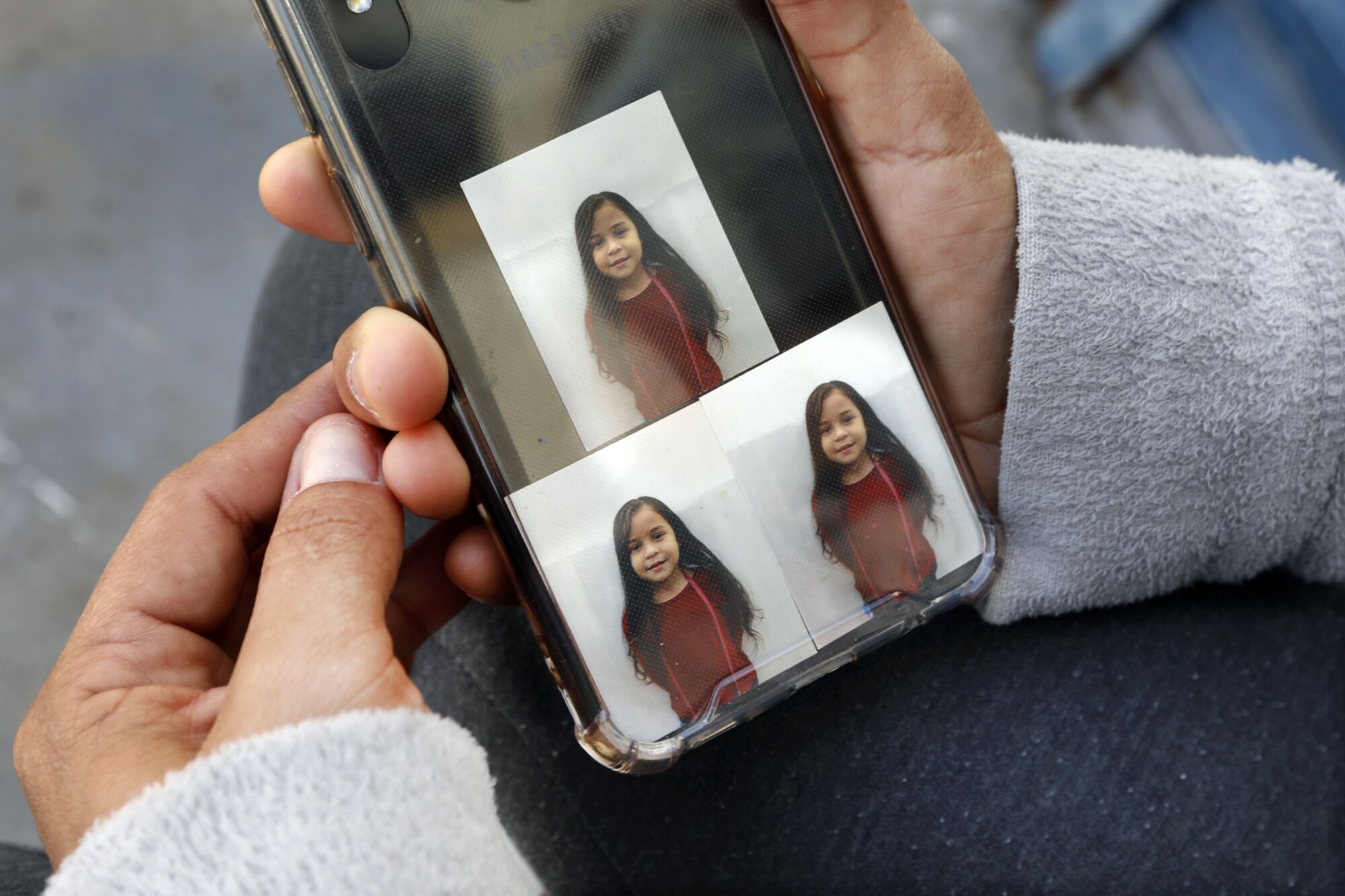 Pictures of a young girl on a phone. 