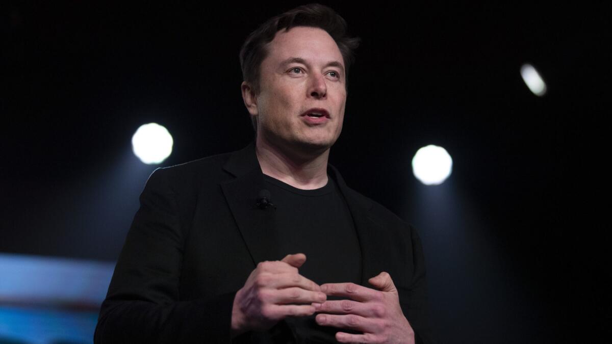 Tesla Chief Executive Elon Musk speaks at the company's design studio in Hawthorne on March 14.