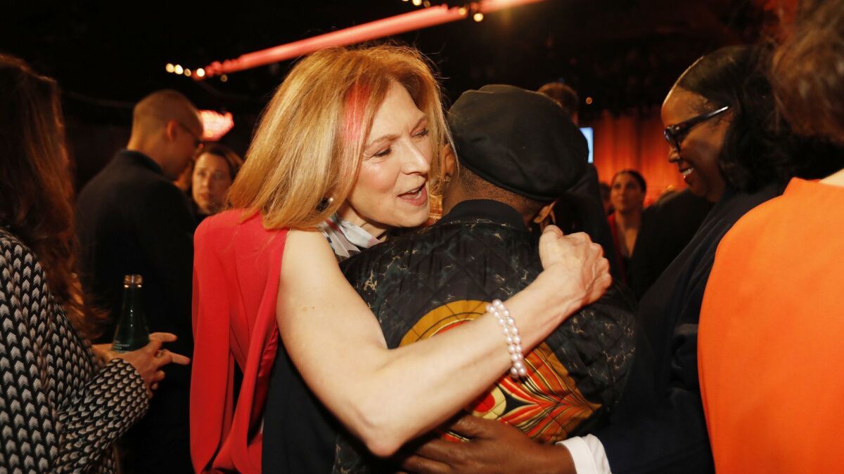 Dawn Hudson, chief executive of the Academy of Motion Picture Arts and Sciences, embraces Spike Lee at the nominees luncheon for the 91st Oscars this year.
