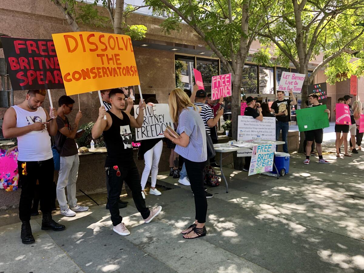 Britney Spears fans protest her conservatorship outside an L.A. courthouse in 2019.
