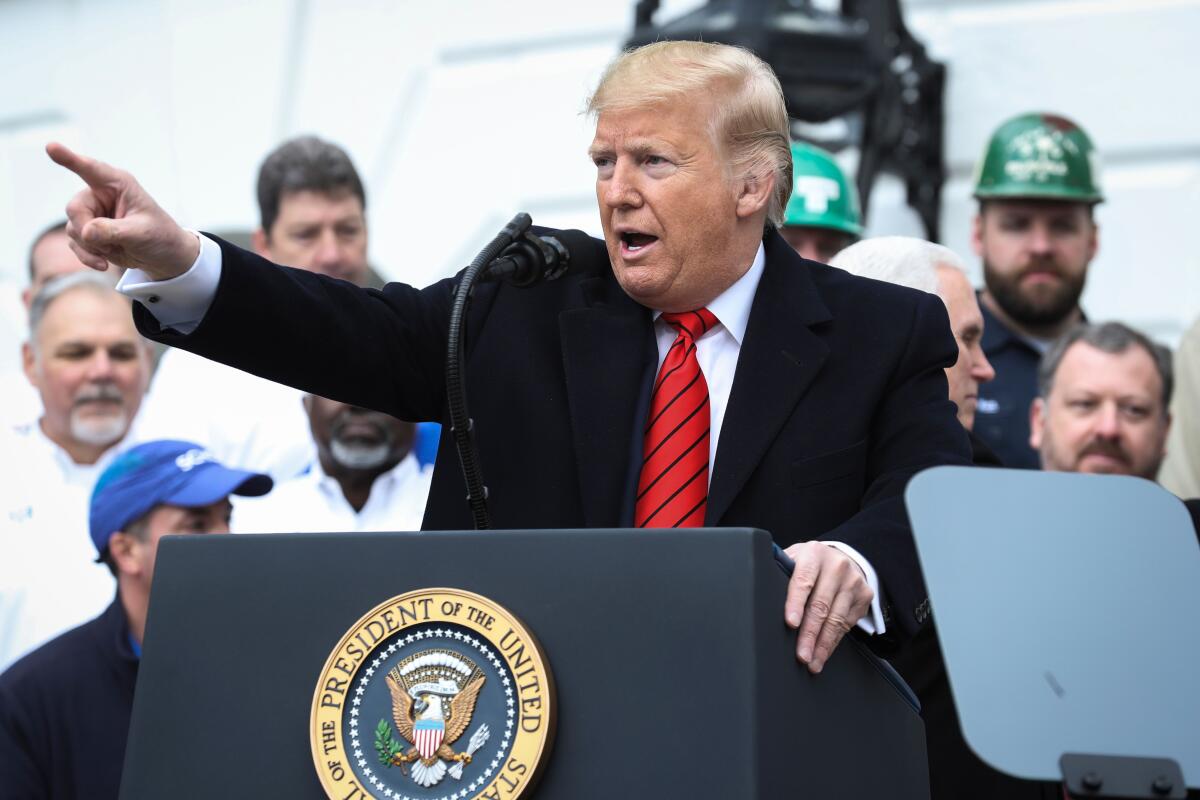 President Trump participates in a signing ceremony for the United States-Mexico-Canada Agreement on trade at the White House on Wednesday. 