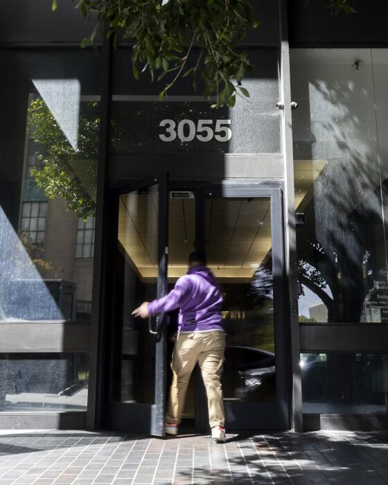 A person enters the building where is located the office of The TransLatin@ Coalition in Los Angeles, California, USA, 05 April 2024.