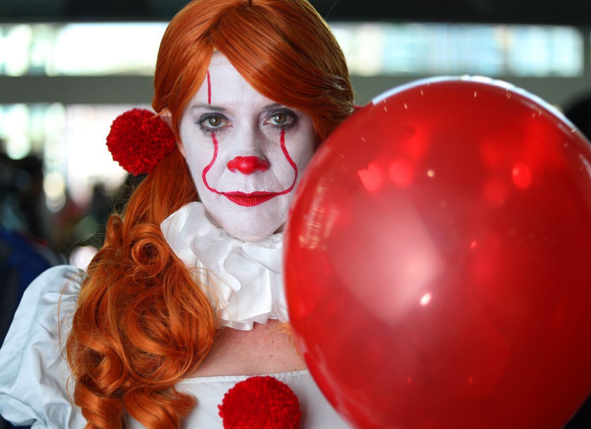 Sandra Sanchez of Culver City dressed as Pennywise from "It" at Comic-Con International in San Diego on Thursday.