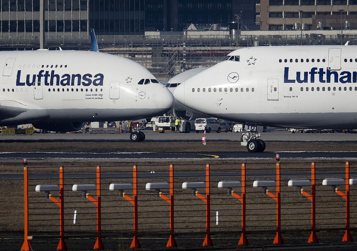 Airbus and Boeing planes at airport