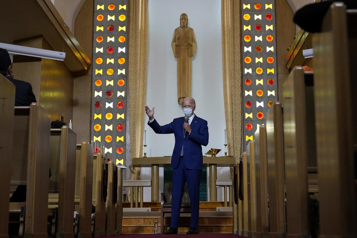 Democratic presidential nominee Joe Biden speaks at Grace Lutheran Church in Kenosha, Wis., on Thursday.