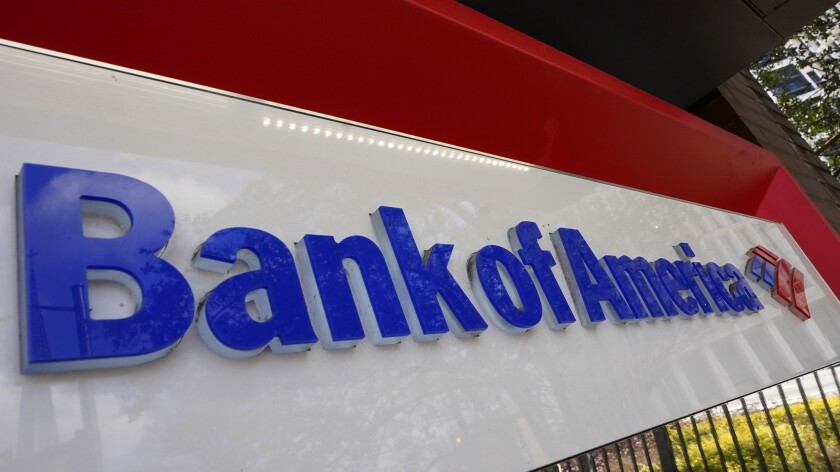 Bank of America signage is shown Wednesday, Feb. 10, 2021, in Atlanta. The nation’s largest banks are expected to report big profits for the first quarter, Tuesday, April 13, amid renewed confidence that pandemic-battered consumers and businesses can repay their debts and start borrowing again(AP Photo/John Bazemore)