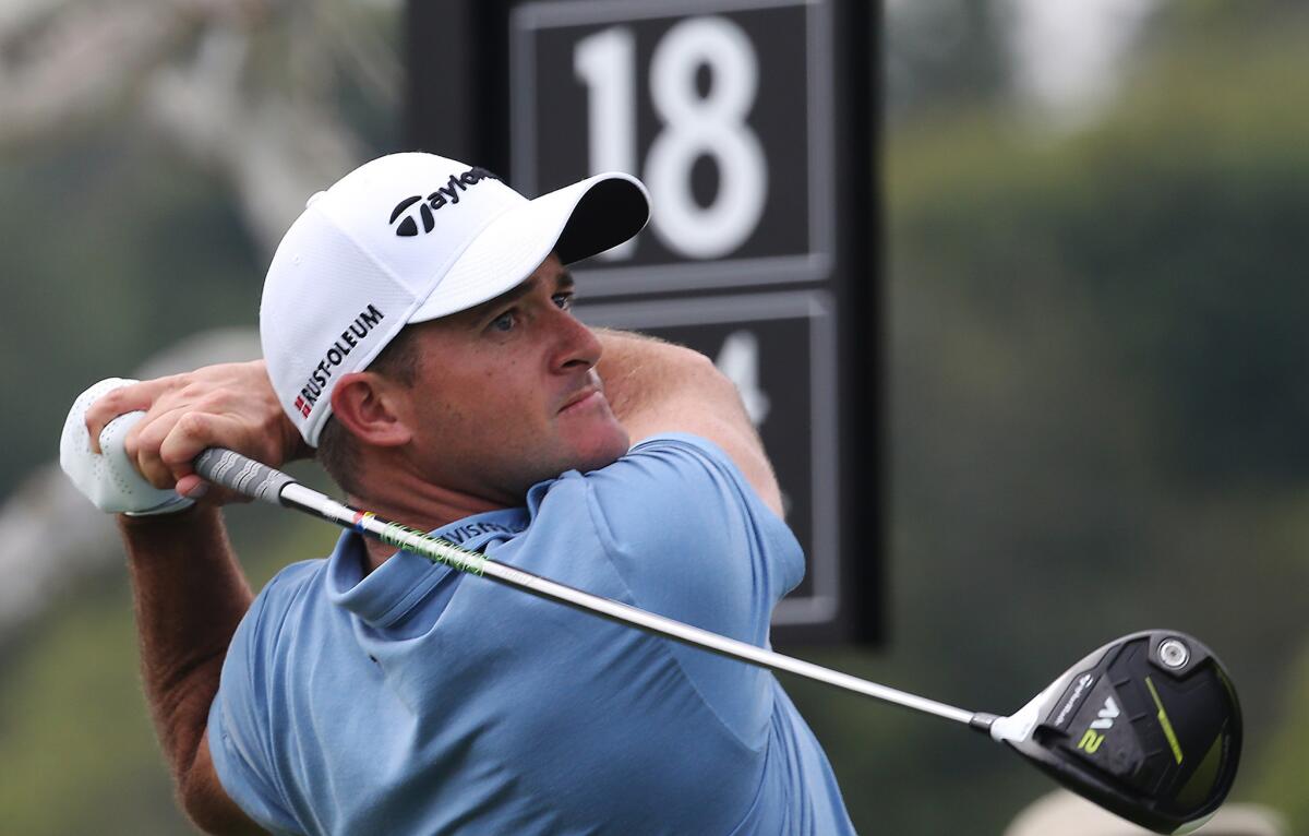 Sam Saunders plays the 18th hole in the first round of the Genesis Open at Riviera Country Club in Pacific Palisades on Feb. 16. Saunders, 29, is the grandson of the late golfing great Arnold Palmer.