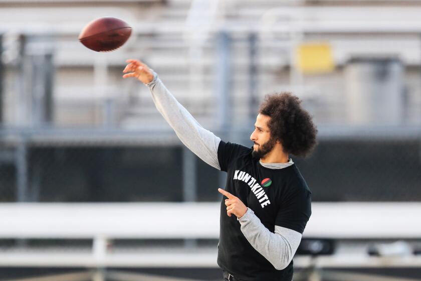 RIVERDALE, GA - NOVEMBER 16: Colin Kaepernick looks to make a pass during a private NFL workout held at Charles R Drew high school on November 16, 2019 in Riverdale, Georgia. Due to disagreements between Kaepernick and the NFL the location of the workout was abruptly changed. (Photo by Carmen Mandato/Getty Images)