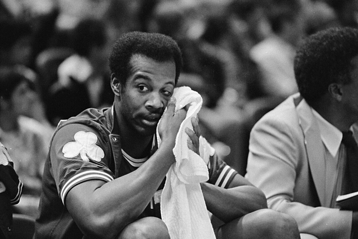 FILE - Boston Celtics' Kermit Washington wipes his brow in the second quarter against the Golden State Warriors at Oakland, Calif., Feb. 15, 1978. Washington, was playing his first game since Dec. 9 altercation with Rudy Tomjanovich of Houston. (AP Photo, File)