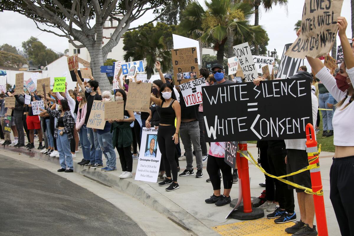 Black Lives Matter protesters hold a rally at Laguna Beach on June 5.  