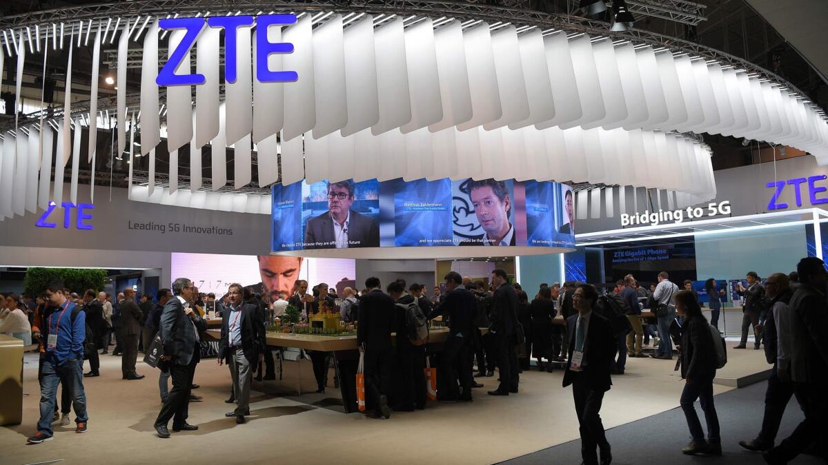 ZTE Corp.'s area at the Mobile World Congress in Barcelona on Feb. 27, 2017. The Chinese phone maker has agreed to plead guilty and pay the United States $892 million for violating trade sanctions against Iran.