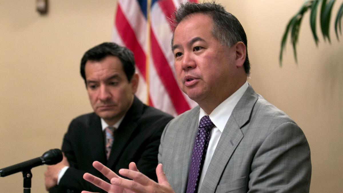 Assemblyman Phil Ting (D-San Francisco), right, has introduced a bill to automatically expunge records of lower-level crimes.