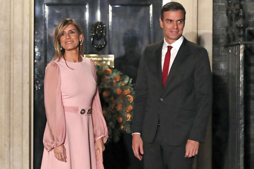 FILE - Spanish Prime Minister Pedro Sanchez and his wife Begoña Gómez arrive at 10 Downing Street, in London, Dec. 3, 2019. A Spanish investigative judge has summoned the wife of Spain’s prime minister to give testimony as part of a probe into allegations that she used her position to influence business deals, a Madrid-based court said Tuesday, June 4, 2024. Gómez is to appear at court on July 5 to answer questions. (AP Photo/Alastair Grant, File)